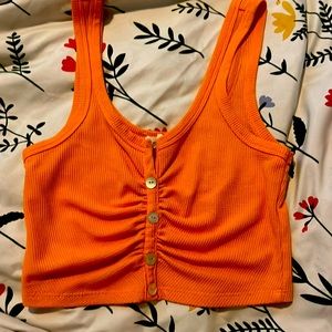 Bright orange crop top